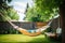 hammock tied between trees in a lush backyard