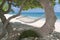 An hammock in tropical paradise turquoise water sand beach