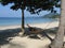 Hammock on white sandy beach