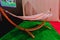 Hammock on a wooden stand. Multicolored hammock fabric