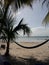 Hammocks over ocean in Isla Mujeres Cancun Mexico beach travel tourism ocean blue water sky sunny