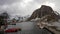 Hamnoy fisherman port in Norway , timelapse video over Lofoten Archipelago , fjord covered in snow, polar circle