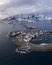 Hamnoy Village and Mountains in Winter. Norwegian Sea and Stormy Sky. Moskenes, Lofoten Islands, Norway. Aerial View