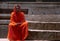 Hampi, India: Pilgrim sitting inside hindu temple