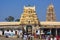 HAMPI, KARNATAKA, INDIA, NOVEMBER 2017, Visitors visits carved outer gopuram of Virupaksha Temple known as the Pampavathi temple,.