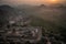 Hampi view from matanga hill at sunrise over the achyutaraya temple india karnakata with foggy