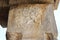 Hampi Vittala Temple Stone Pillar Carving of Hanuman monkey god lifting huge or massive rocks or boulders