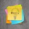 Han drawn light bulb and CREATIVE word design on sticky note