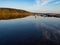 Hancza Lake, the deepest lake of the Poland. Sunny day, late afternoon, sky reflecting in the water.