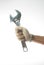 Hand and adjustable wrench