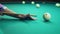 Hand aiming and hits the ball of russian billiards.