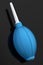 Hand air blower bulb for camera isolated on black background.