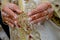 The hand of the Arab bride is tattooed with red henna. Arab wedding traditions