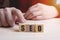 Hand arrange wood letters as SEO abbreviation Search Engine Optimization