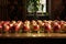 hand-arranged rows of gleaming apples on a table