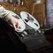 Hand arranging a tape in a reel-to-reel recorder