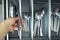 Hand arranging washed silverware
