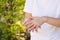 Hand of Asian woman rubbing after applying the hand sanitizer. Safe step after getting the alcohol gel and wait for it to dry