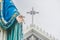 Hand of The Blessed Virgin Mary statue standing in front of The Roman Catholic Diocese.