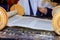 Hand of boy reading the Jewish Torah at Bar Mitzvah