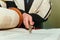 Hand of boy reading the Jewish Torah at Bar Mitzvah