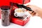 Hand brewing coffee with a bright red color espresso coffee machine