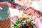 Hand of a bride receiving holy water from elders in thai culture wedding ceremony