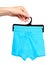 Hand with bright boxer underwear, cotton pants