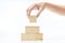 Hand build a pyramid from a wooden block