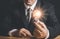Hand of businessman holding illuminated light bulb, idea, innovation and inspiration concept