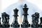 hand of businessmen moving chess in competition shows leadership, followers and business success strategies