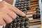 Hand calculated on Old abacus