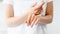 hand care skin moisturizing woman rubbing cream