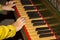 Hand of Child Playing Medieval Harpsichord in a Castle in Italy