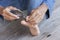 Hand of children cutting toenail.