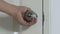 Hand closing and locking door knob