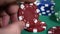 Hand Collects Poker Chips