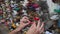 Hand and colored padlocks on the bridge