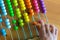 Hand Counting Colorful Beads Abacus