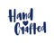 Hand Crafted. Slogan for labels or tags of handmade goods written with elegant creative calligraphic font and decorated