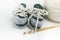 Hand crocheted baby shoes with wool, crochet needle