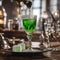 A hand delicately dropping a sugar cube into a glass of absinthe using an ornate spoon2