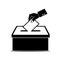 Hand Depositing a Vote in a Political Ballot Box