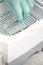 Hand disinfects tweezers with cleaning systems for medical instruments. Ultrasonic cleaner.