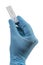 Hand in disposable glove holding positive sars-cov-2 rapid antigen test