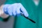 Hand of doctor holding scalpel