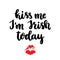 The hand-drawing fun inscription: Kiss me I am Irish today, of black ink on a white background, for St. Patrick`s Day.