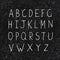 Hand-drawn Alphabet on Aged Blackboard Texture