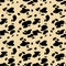 Hand drawn black and yellow seamless pattern stylized animal skin Dalmatians. Can be used for design on fabric, wallpaper