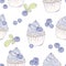 Hand drawn blueberry cupcake seamless pattern